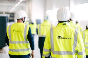 Men in Equans vests
